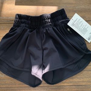 Lululemon shorts.Size zero.1 zipper pocket. Never worn.Tag still attached.